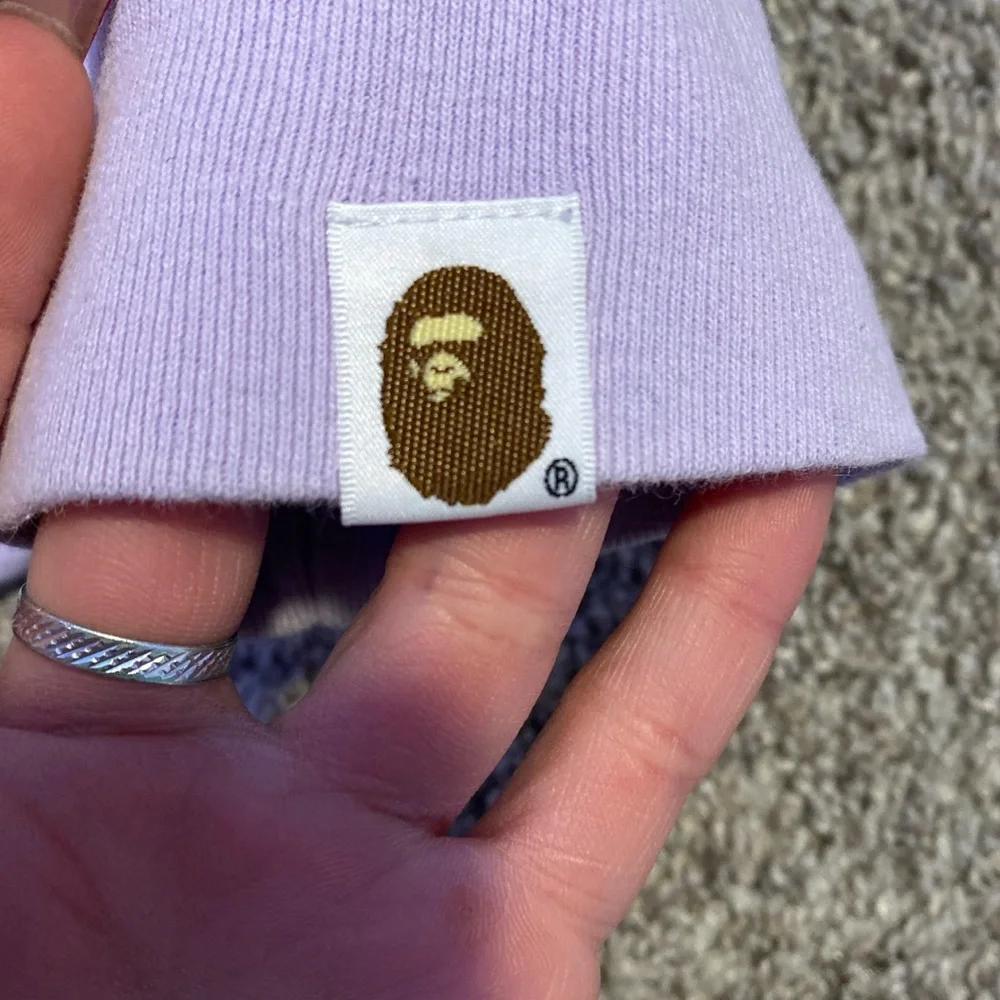 Bape Shark Mouth T shirt. A lavender color, size medium, and is unisex - Picture 4 of 4